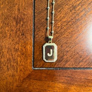 Uncommon James Sur 2.0 “J” necklace.